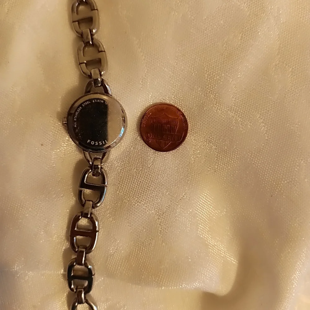 Fossil silver tone bracelet watch lime green rhinestone dial